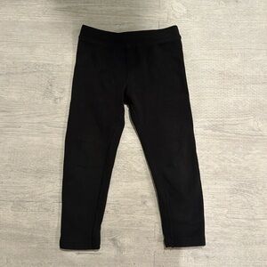 Primary Black fleece lined pants.